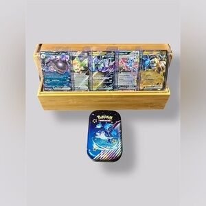 Pokemon EX Foil Cards with Mini Pafin Dolphin Tin Set